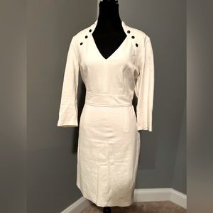 White House Black Market V-Cut Dress White with black buttons on the shoulders.